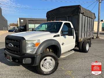 4WD 6.7L POWER STROKE DIESEL FLAT BED STAKE TRUCK!