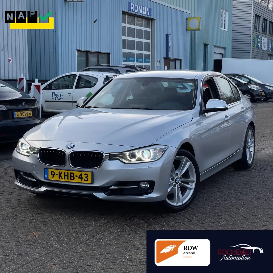 BMW 320 Sport | automaat *LAGE KM* NAP| XENON | NBT | APK Grijs - 1