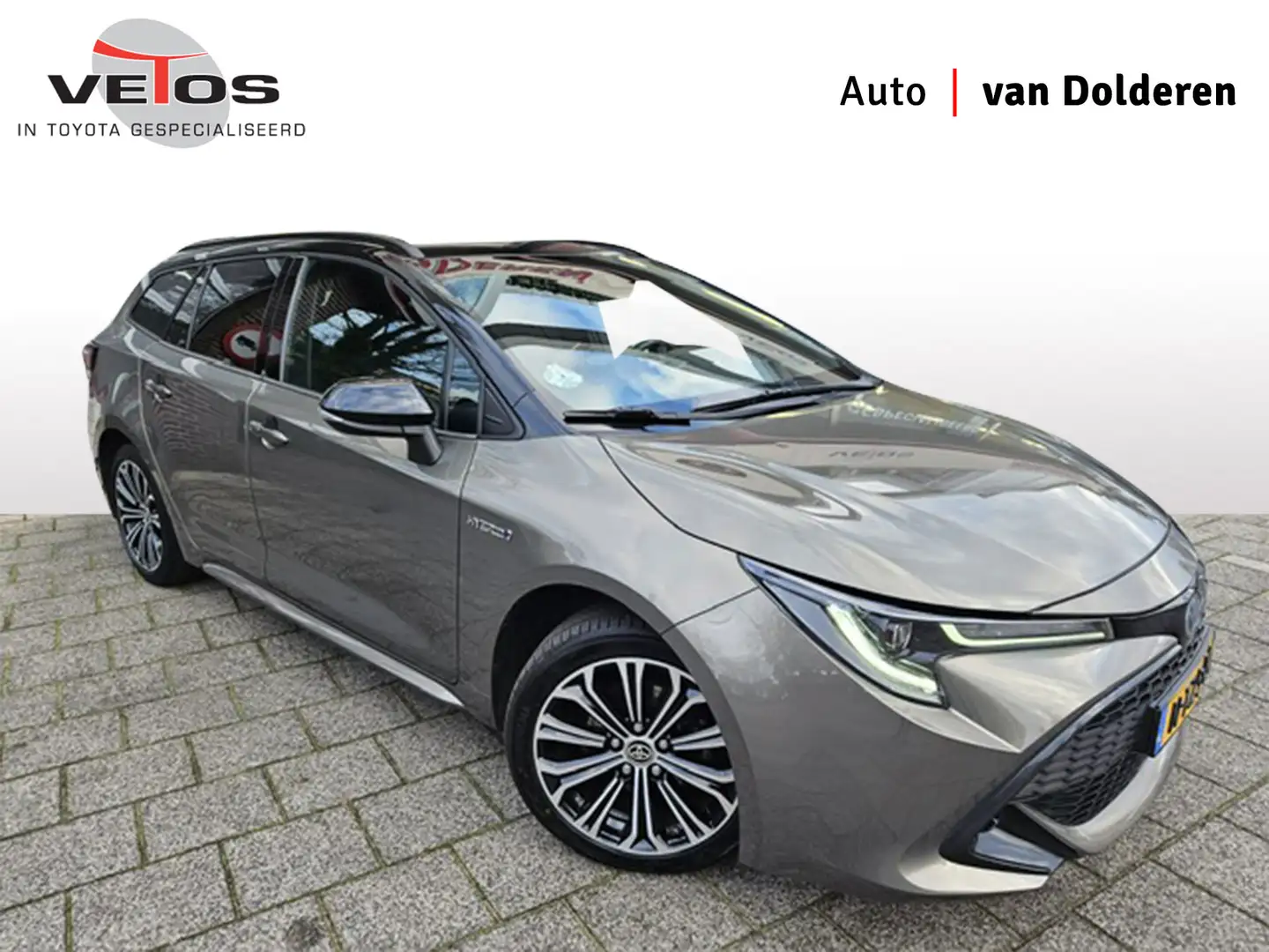 Toyota Corolla Touring Sports 1.8 Hybrid Dynamic Bi-tone Bruin - 1