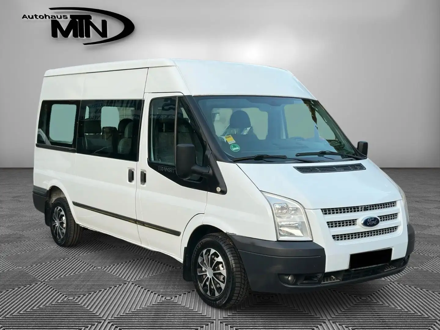 Ford Transit 9.Sitzer H2+L2/KLIMA/TEMPO/AHK/1.HAND Weiß - 1