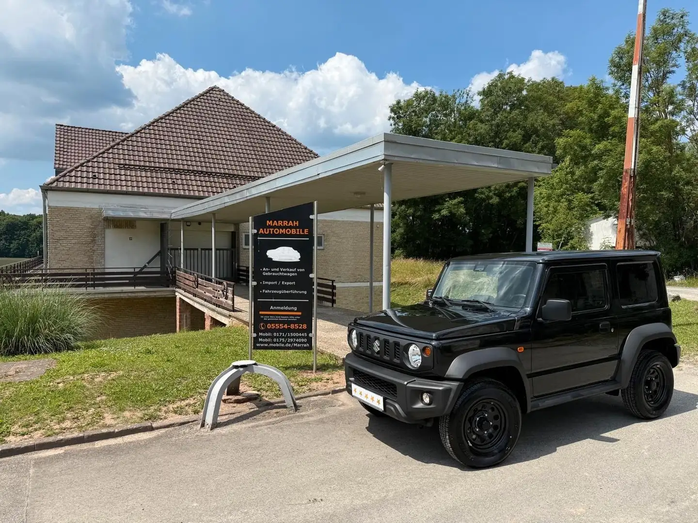 Suzuki Jimny 1.5 ALLGRIP Comfort AUTOMATIK MIT EXTRAS crna - 1