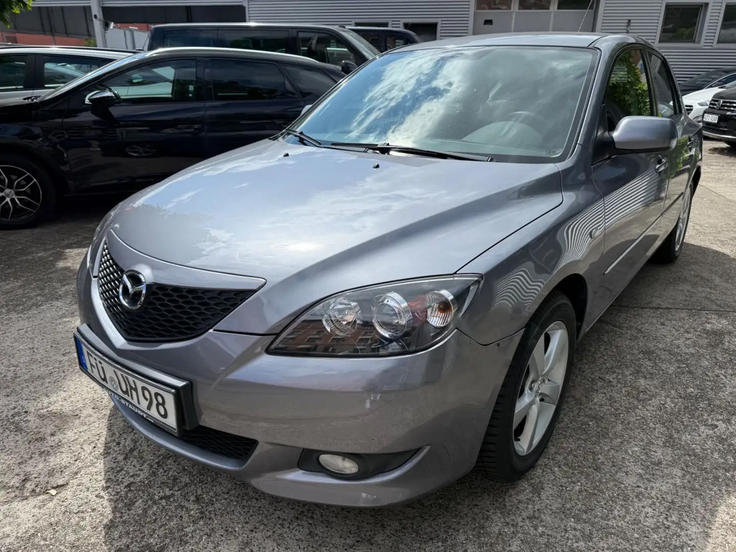 Mazda 3 Lim. 1.6 Sport Comf. -Rentnerfahrzeu/ wenig KM Grijs - 1