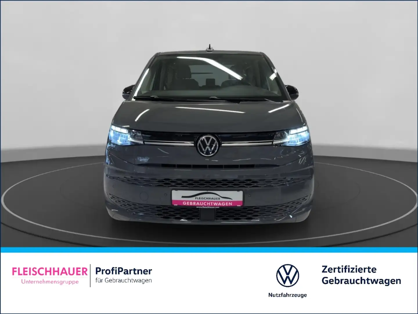 Volkswagen T7 Multivan Life lang 2.0 TDI Navi+LED+Stdhzg+7-Sitzer+VC+App Grau - 2