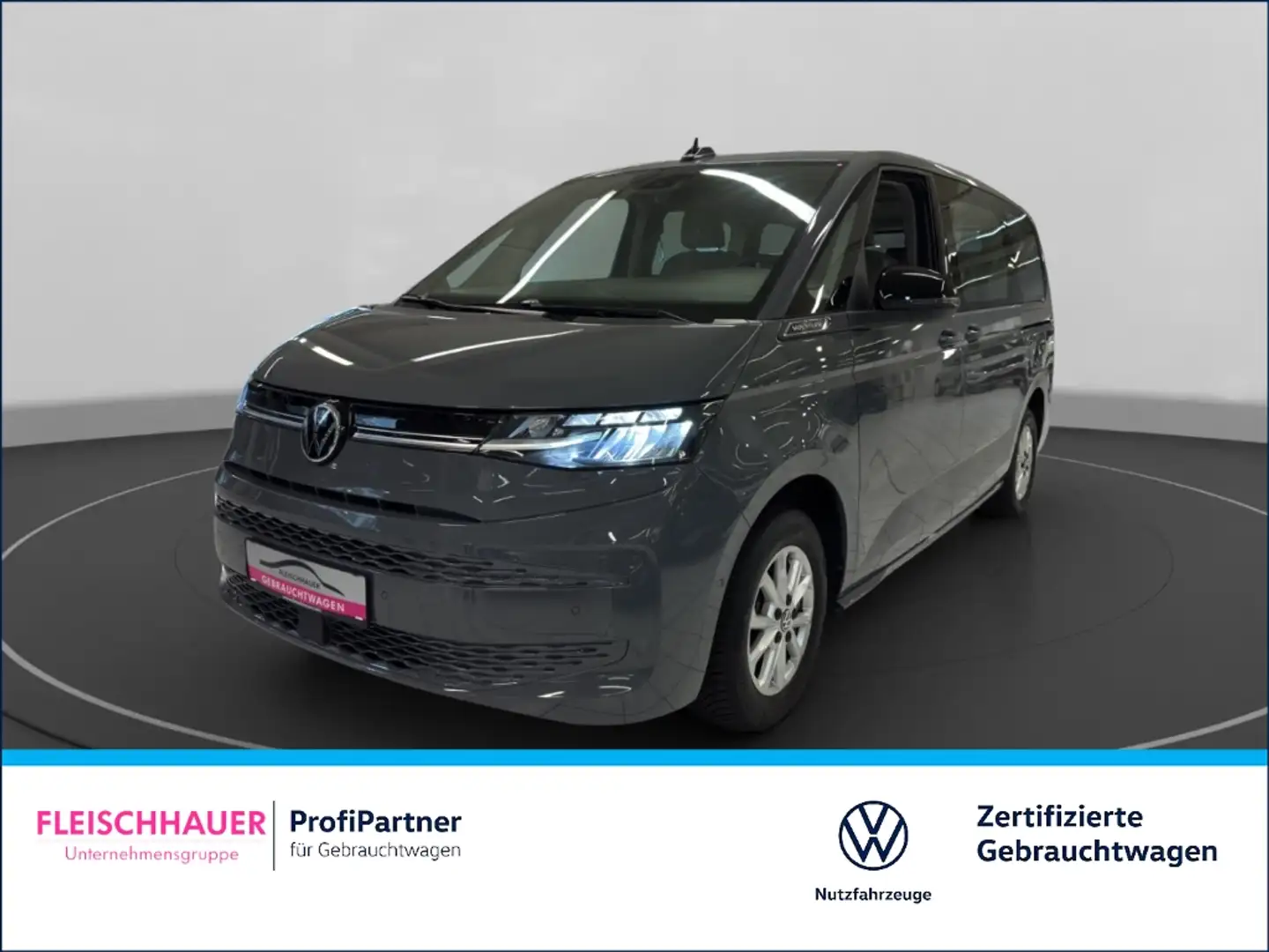 Volkswagen T7 Multivan Life lang 2.0 TDI Navi+LED+Stdhzg+7-Sitzer+VC+App Grau - 1