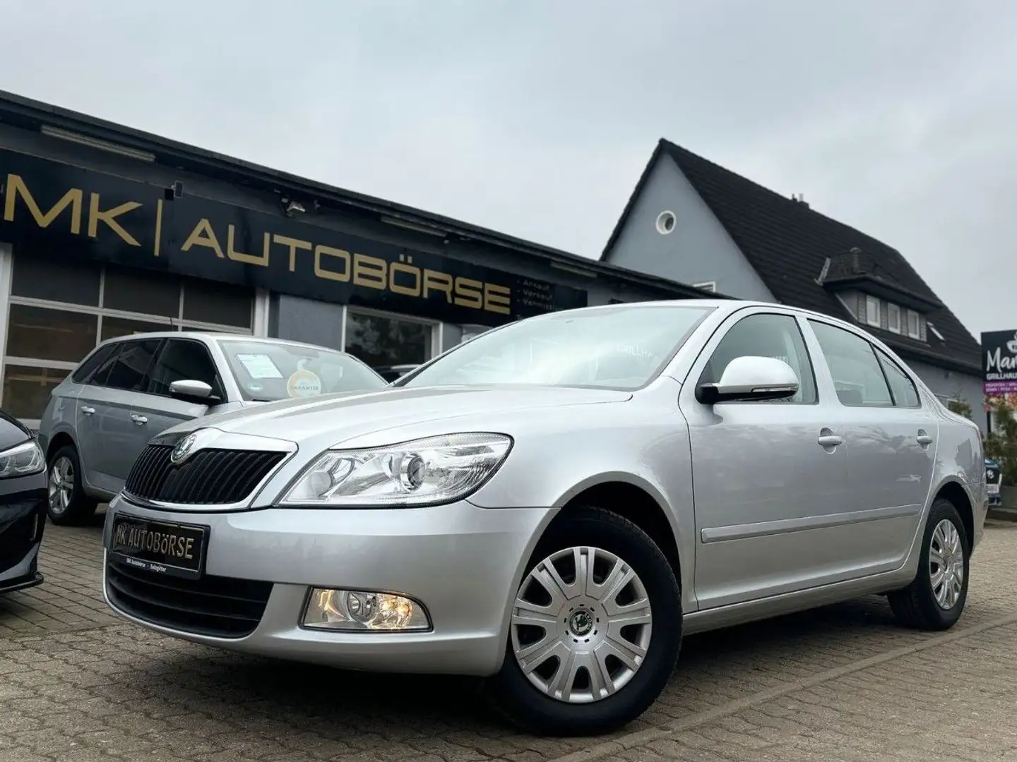 Skoda Octavia Lim.AmbienteOrig.28KM/Scheckheft/Navi/1H Silber - 1