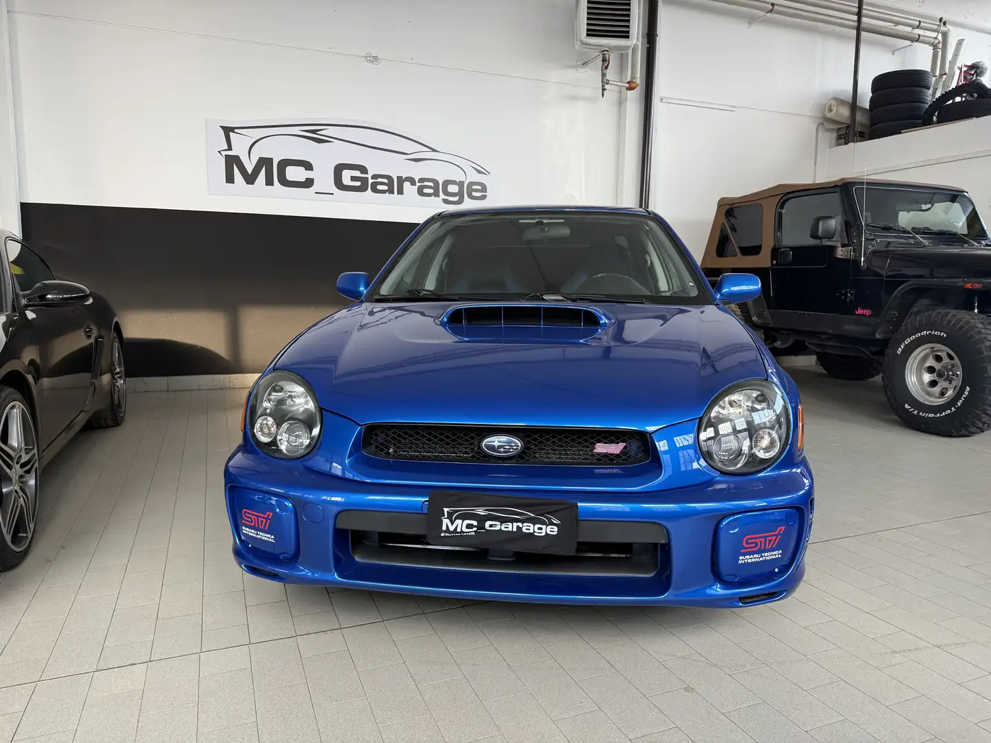 Subaru Impreza Berlina 2.0t STI awd - 2