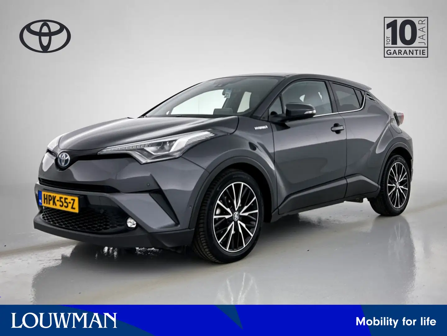 Toyota C-HR 1.8 Hybrid Executive Limited | Navigatie | Leder | Grijs - 1