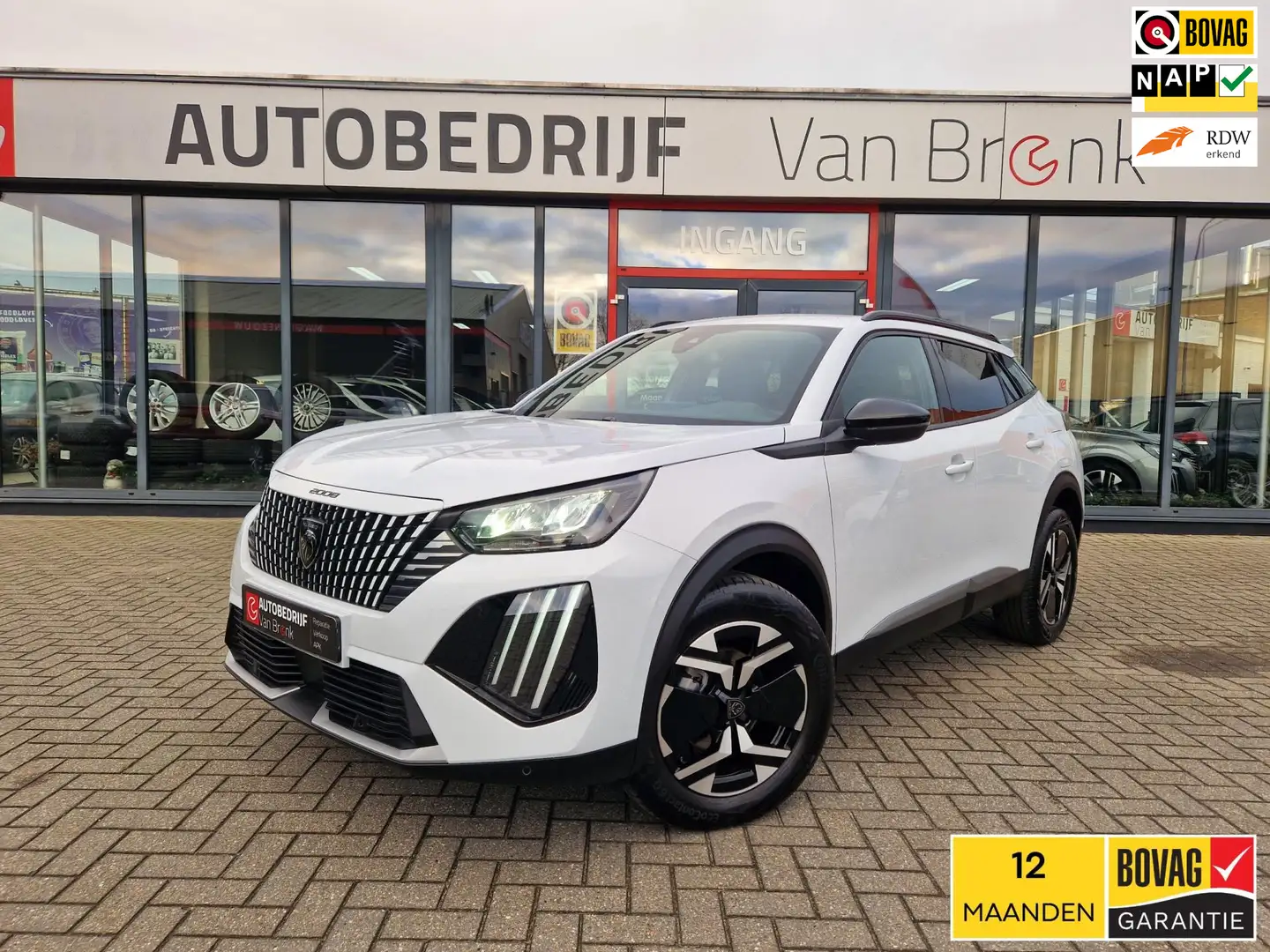 Peugeot 2008 1.2 130PK Allure | Carplay | PDC V+A | Cruise Cont Weiß - 1