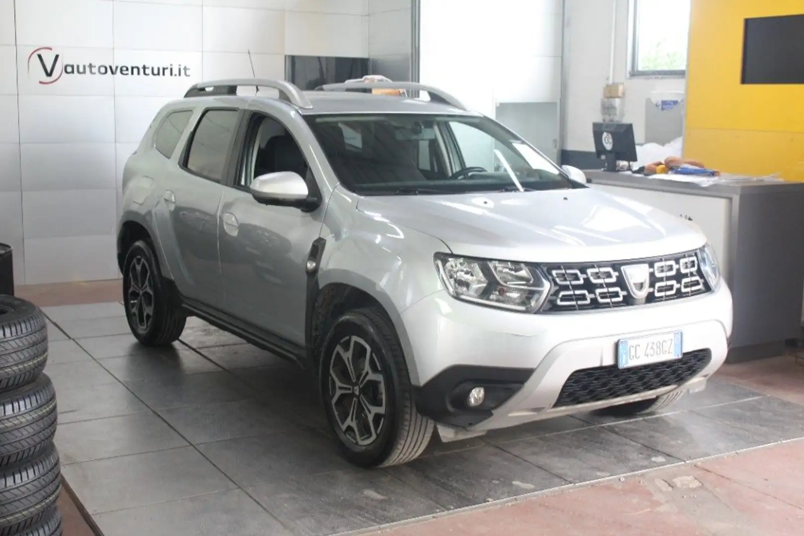 Dacia Duster 1.0 TCe 100 CV ECO-G 4x2 Prestige Zilver - 1