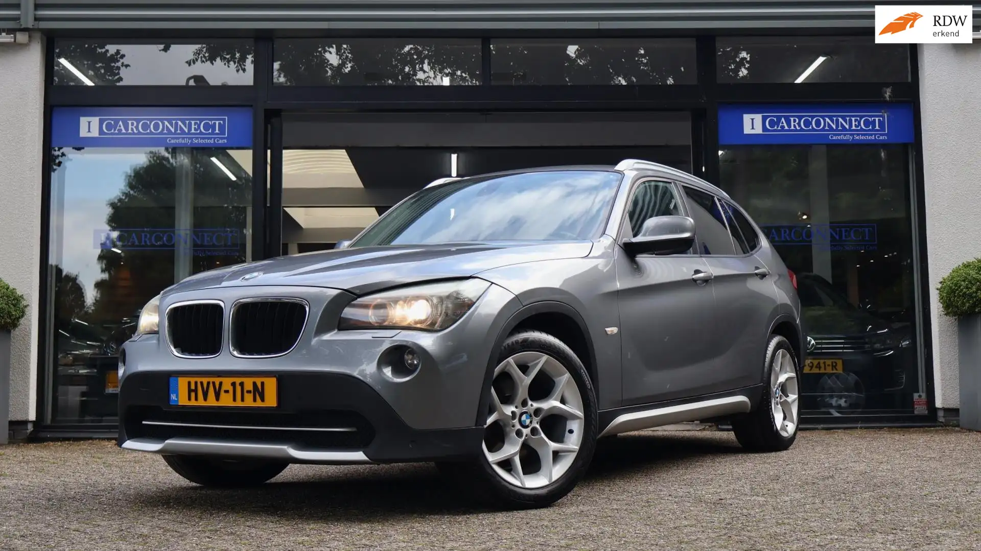 BMW X1 SDrive18i Executive 150pk|Navi|Cruise|Clima|PDC Grijs - 1