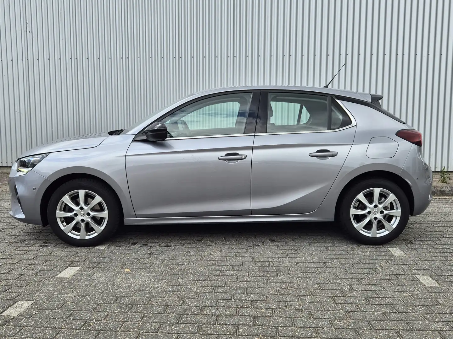 Opel Corsa 1.2 100PK | Elegance | Airco | Cruise control | 16 Grijs - 2