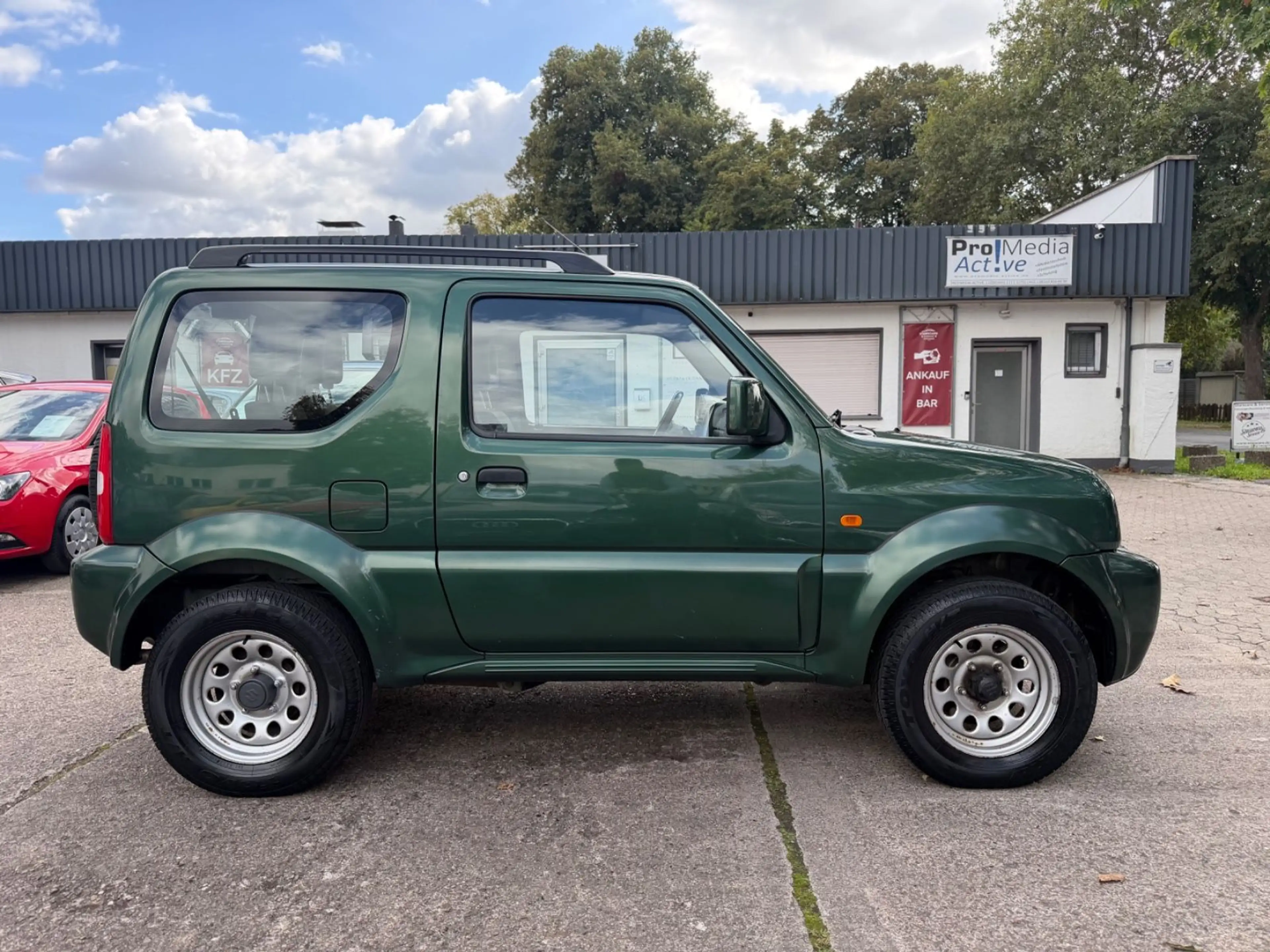 Suzuki Jimny *1.3*4WD*RANGER*ANHÄNGERKUPPLUNG*1.HAND*!! — photo 13