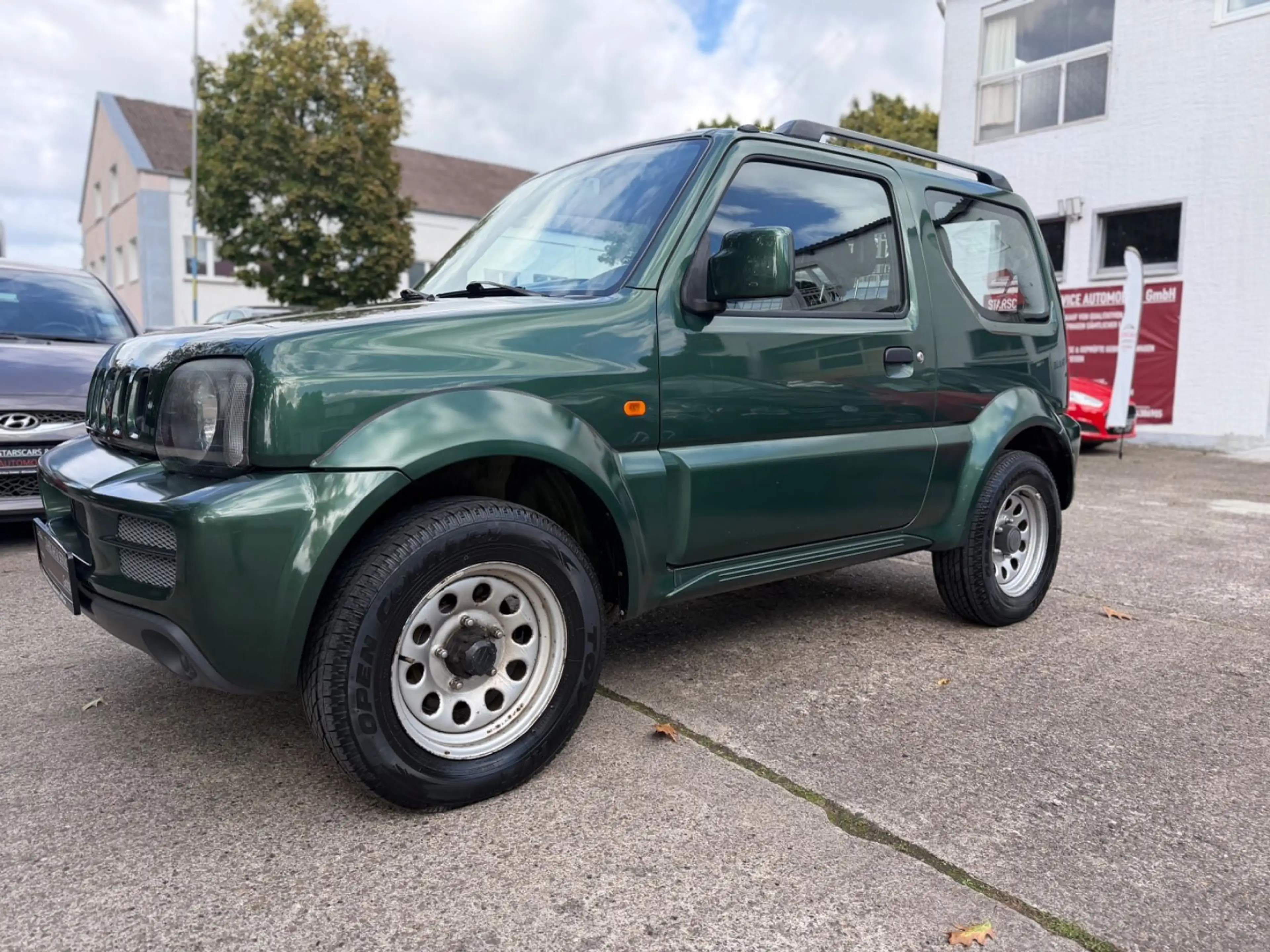 Suzuki Jimny *1.3*4WD*RANGER*ANHÄNGERKUPPLUNG*1.HAND*!! — photo 4