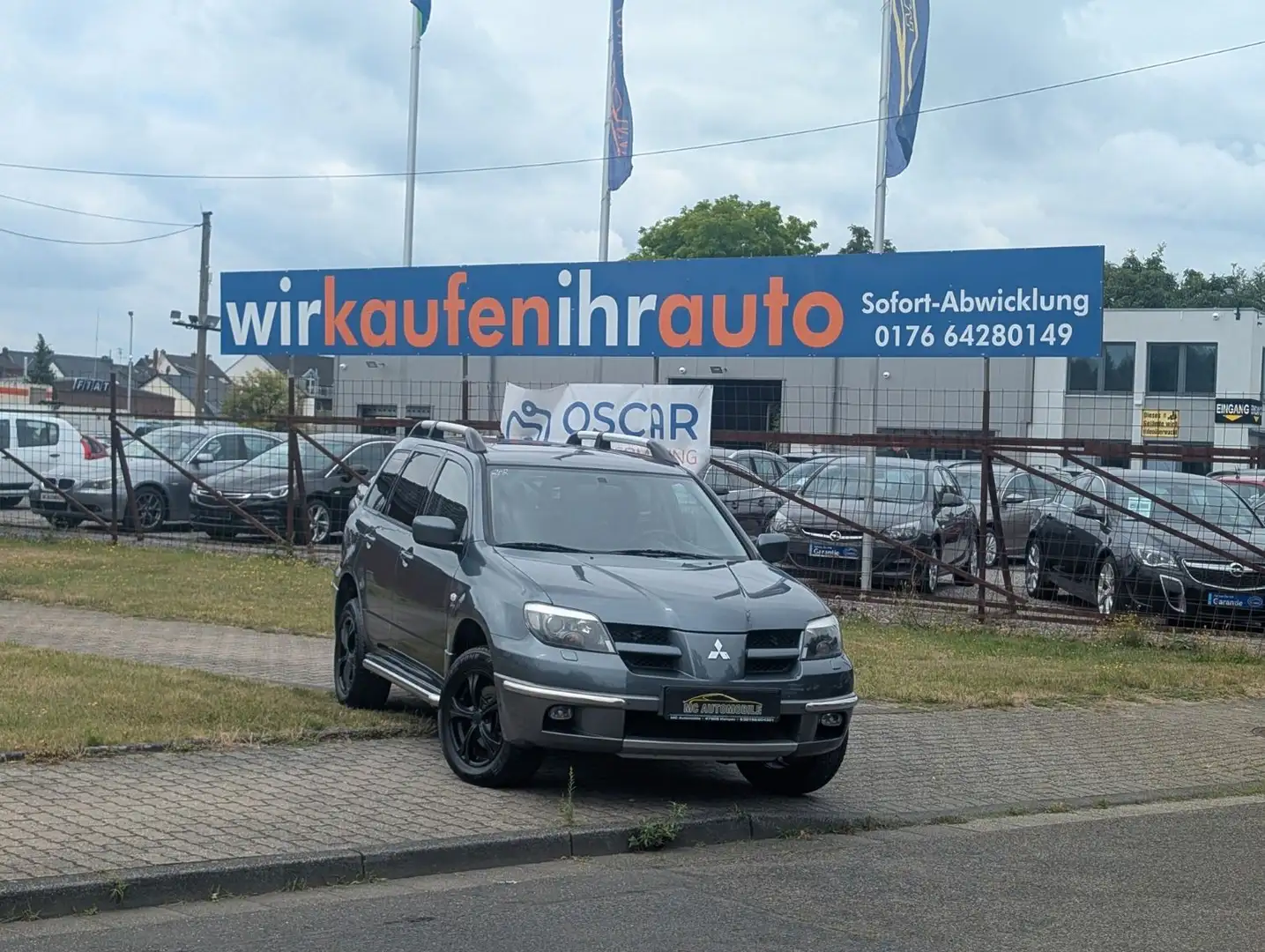Mitsubishi Outlander 2.4 Sport*KLIMA*LEDER*AHK*ZV-FUNK !! Grau - 1