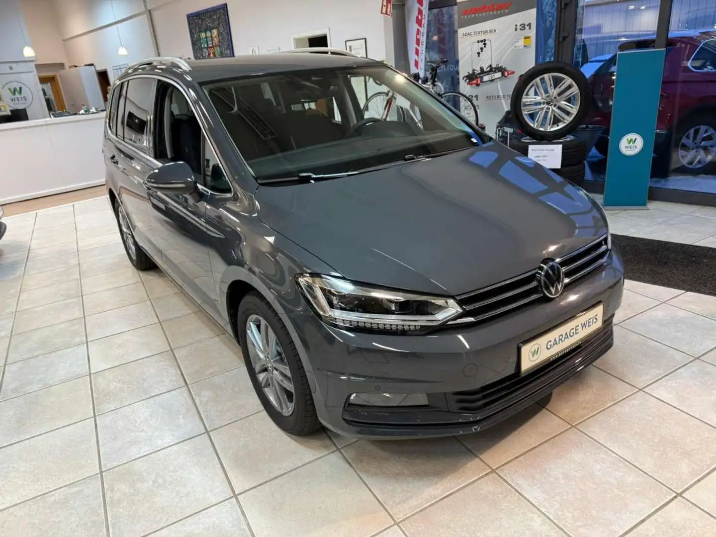 Volkswagen Touran Comfortline 1.5 TSI DSG7 110kW-150CV - 7 Places, L Grijs - 1