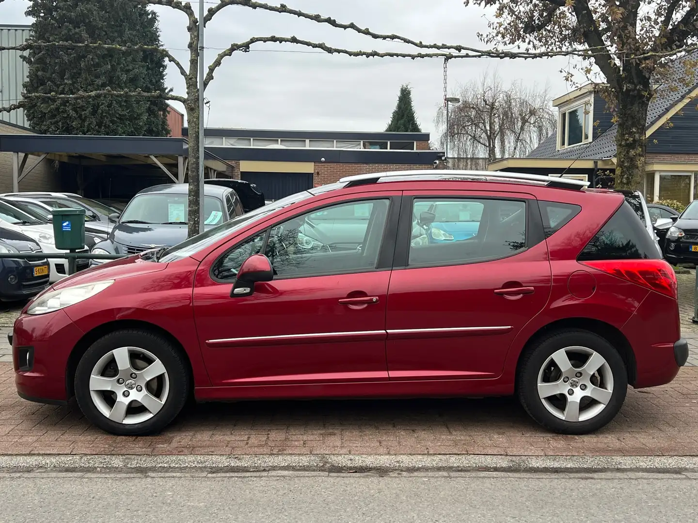 Peugeot 207 SW 1.6 VTi Première *NAVI | AIRCO | PANORAMA Rojo - 2