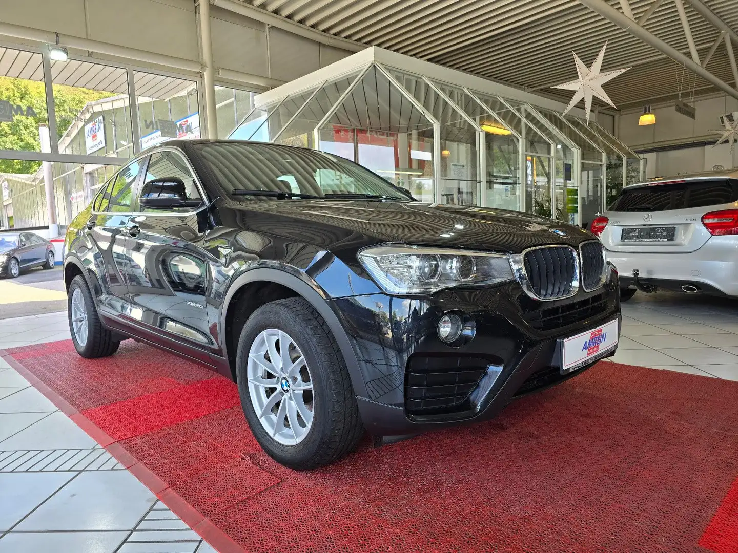 BMW X4 xDrive20i Aut. +KLIMAAUT.+GLASDACH+XENON+ Schwarz - 1