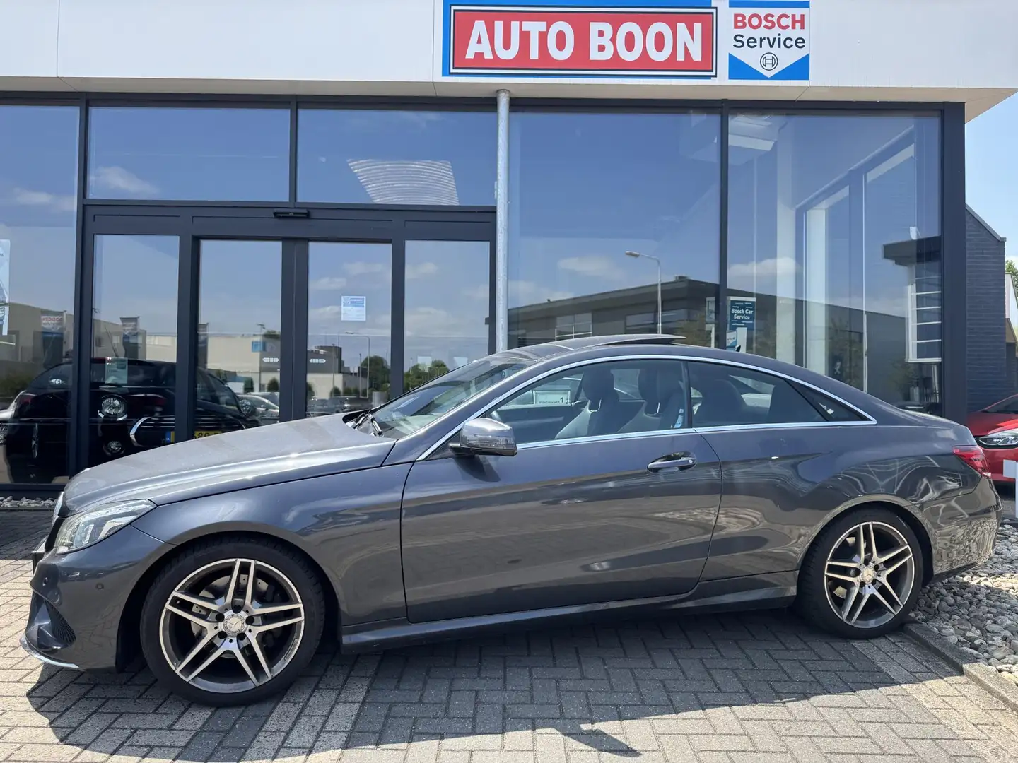 Mercedes-Benz E 200 Coupé 184PK AMG AUTOMAAT /LEER/PANO/NAVI/LED/CLIMA Grijs - 1