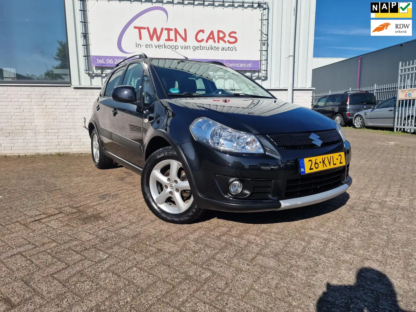 Suzuki SX4 1.6 Comfort airco Zwart - 1