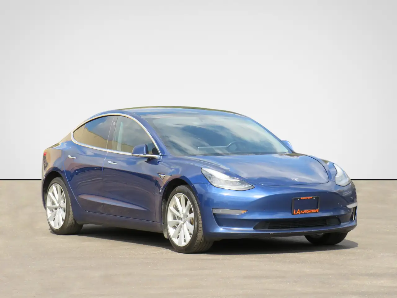 Tesla Model 3 photo Tesla Model 3