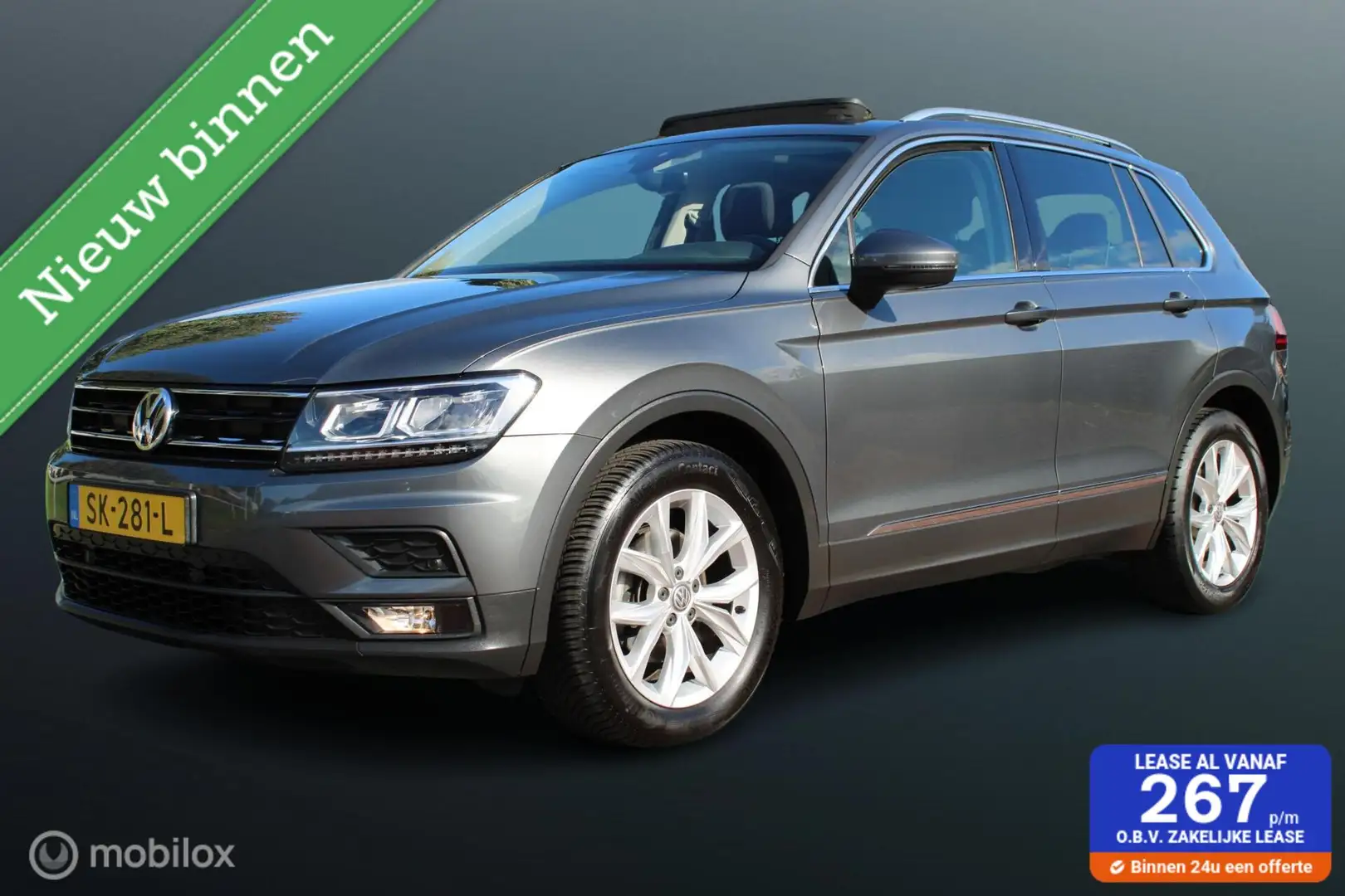 Volkswagen Tiguan 1.4 TSI Comfortline Business, Trekhaak, Panodak, N Grijs - 1