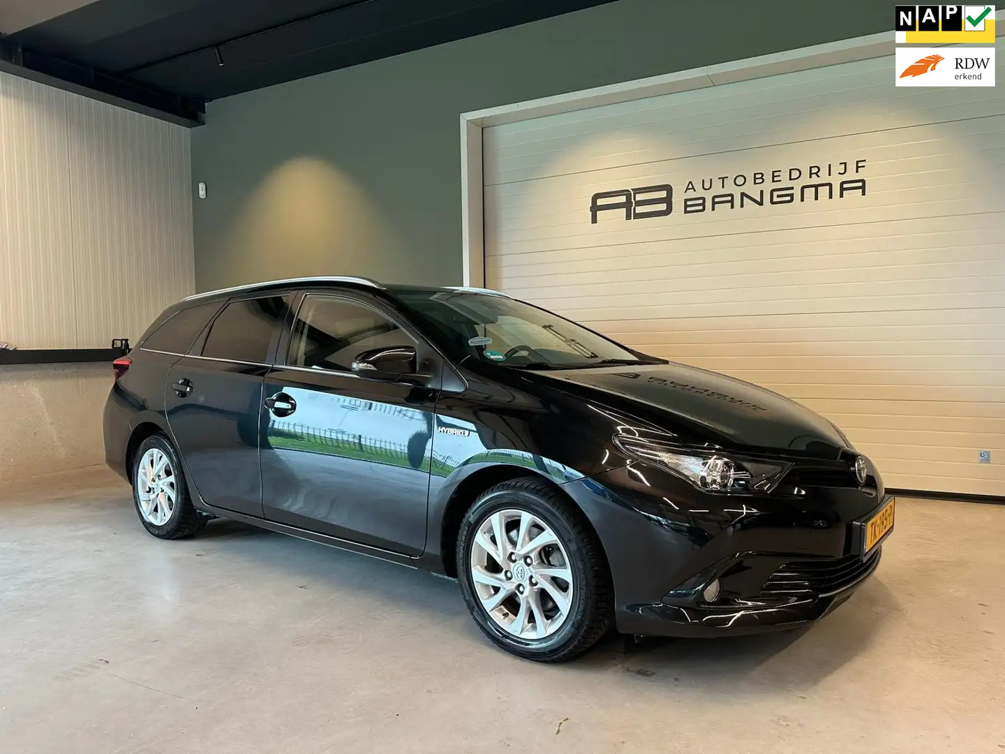 Toyota Auris Touring Sports 1.8 HYBRID AUTOMAAT ENERGY PLUS-uit Negro - 1