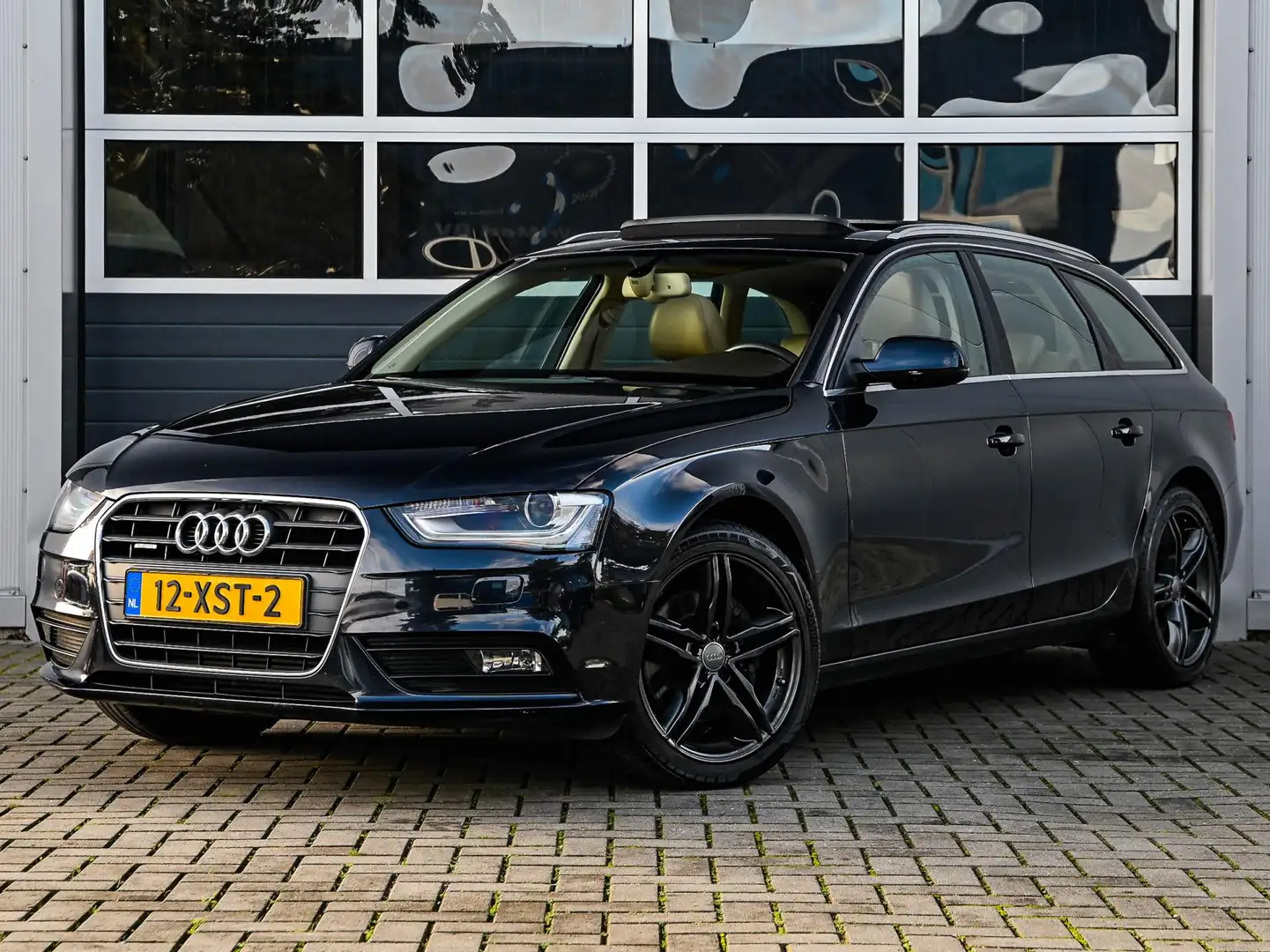 Audi A4 Avant 2.0 TFSI 211pk quattro Pro Line | Panoramada Bleu - 1