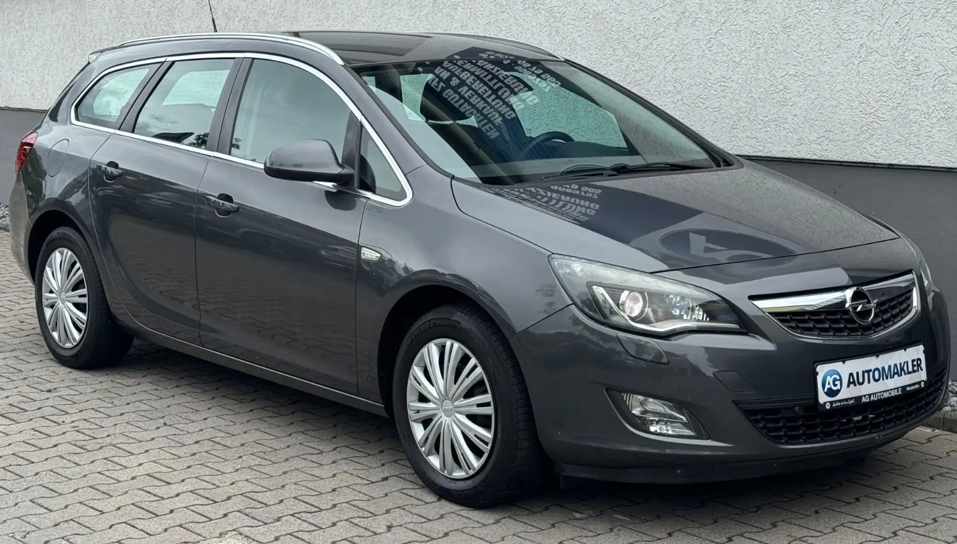 Opel Astra J Sports Tourer BI Xenon  Klimaauto SHZ. Grau - 1