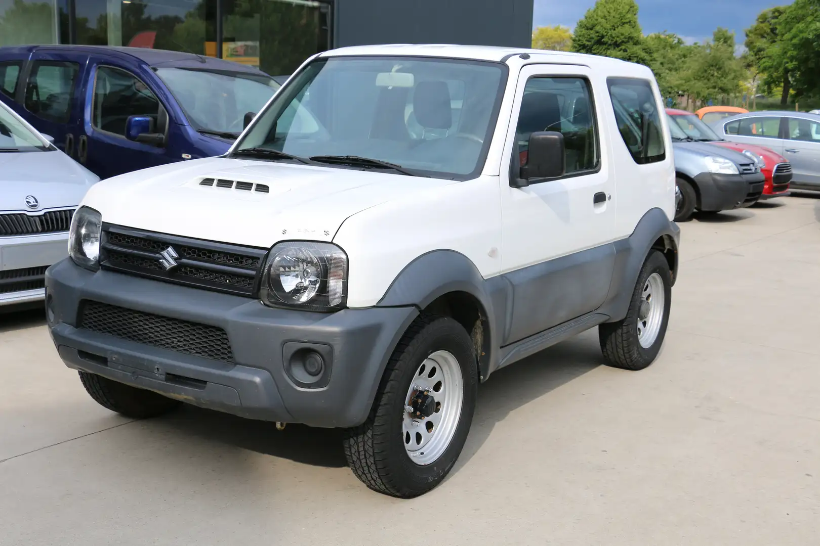 Suzuki Jimny 1.3i JLX 4x4 + 1 jaar garantie Traxio Weiß - 2