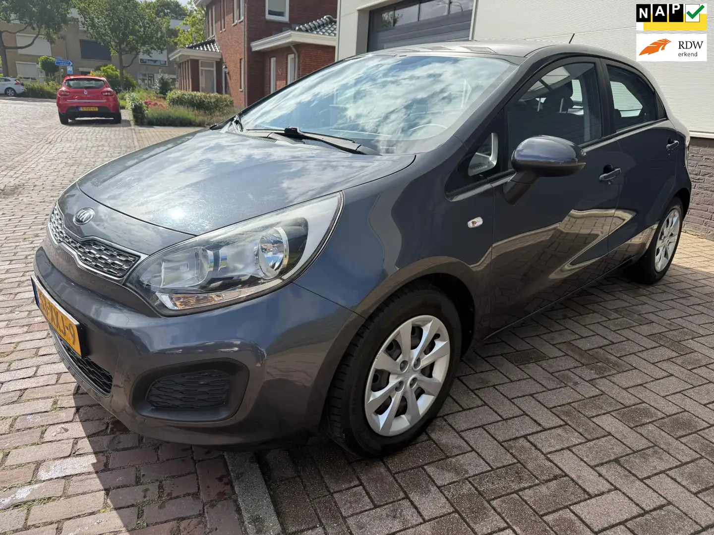 Kia Rio 1.2 CVVT Comfort Pack/1eigenaar/Airco/AUX/Elek-pak Grijs - 1