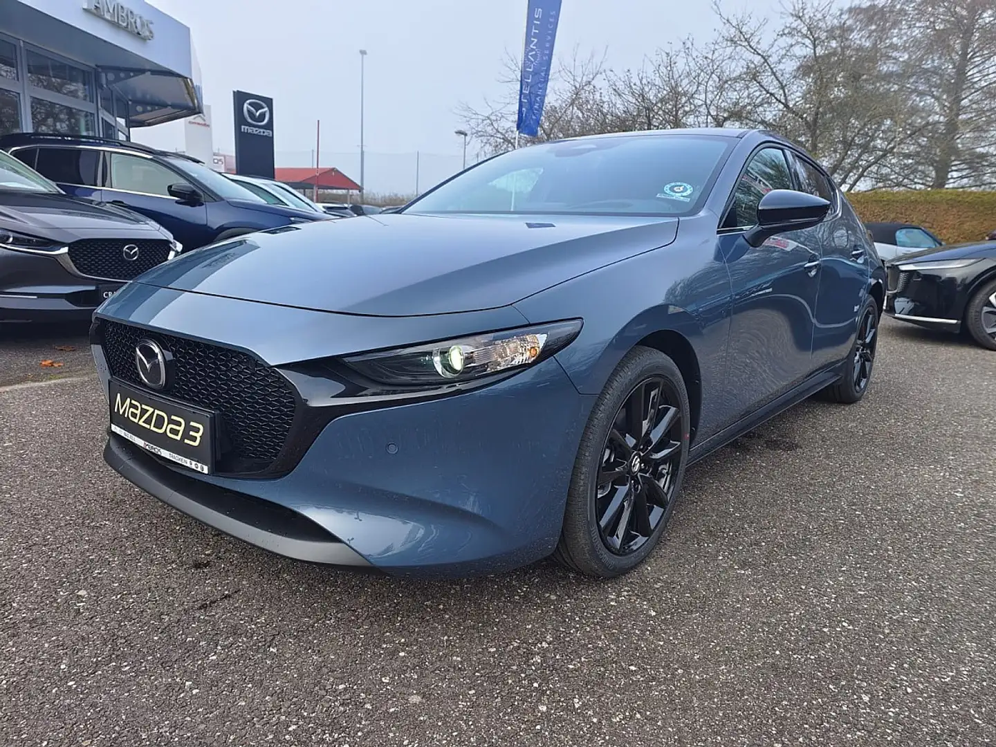 Mazda 3 Mazda3 e-Skyactiv-G140 Automatik Homura INVENTU... Grau - 1