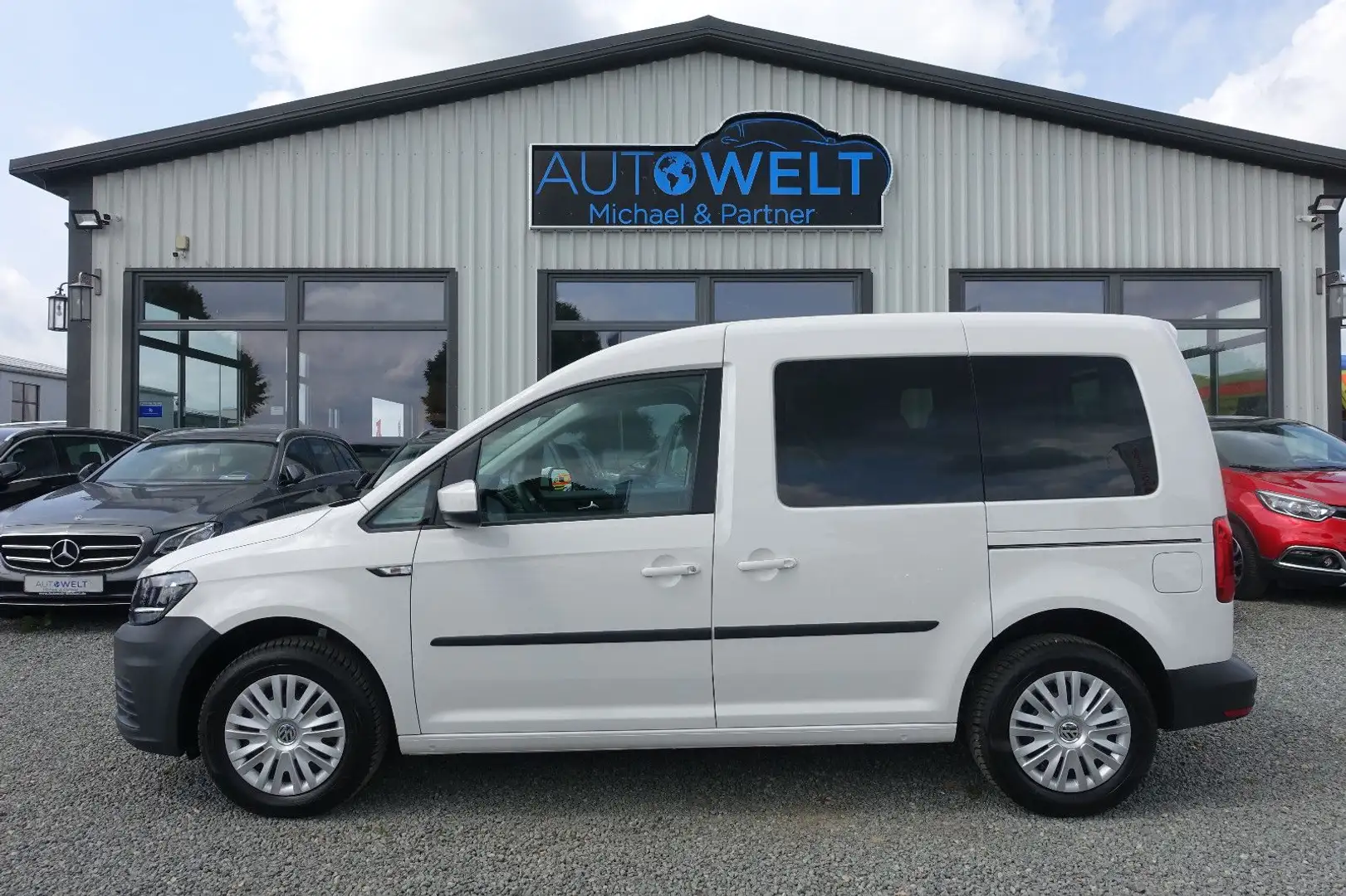 Volkswagen Caddy 1.2 TSI KLIMA SITZH PDC 1.HAND TÜV NEU Weiß - 1