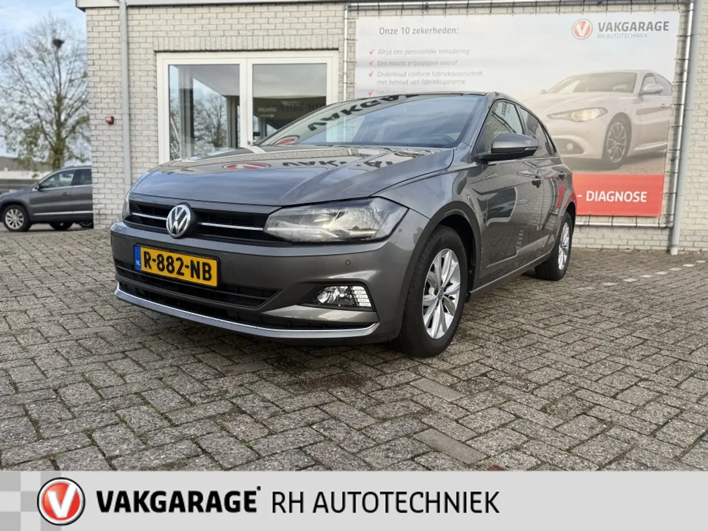 Volkswagen Polo 1.0 TSI Comf.l. Schuifkantel Grijs - 1