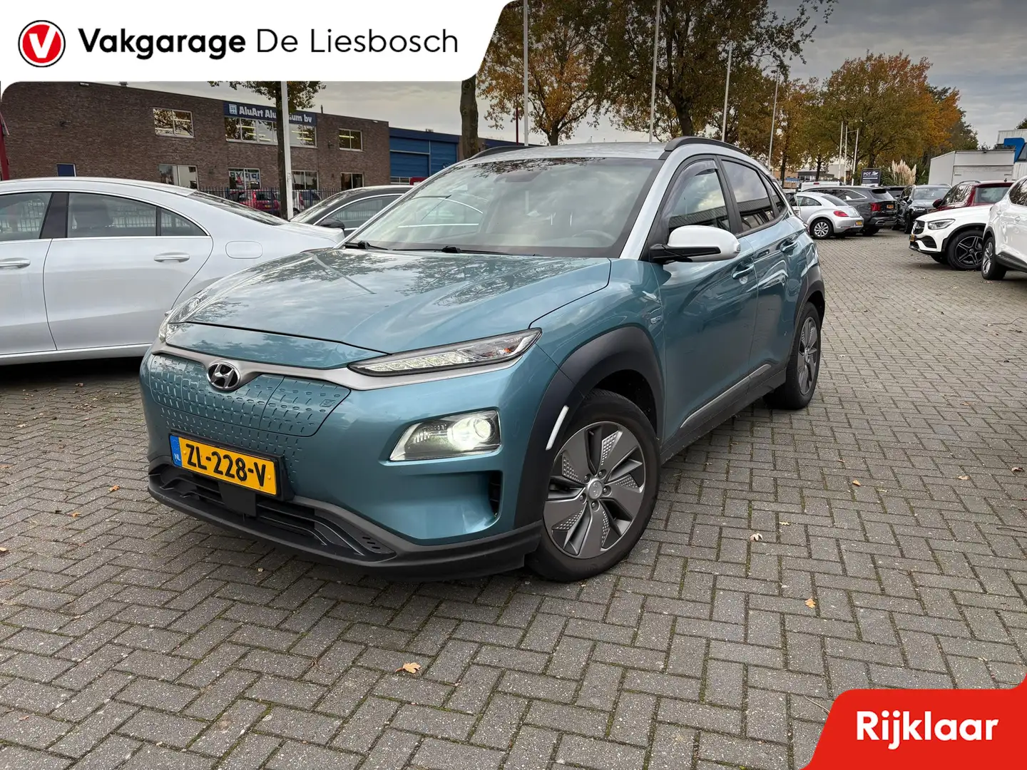 Hyundai KONA EV Fashion 64 kWh/navi/trekhaak/krell audio/camera Blauw - 1
