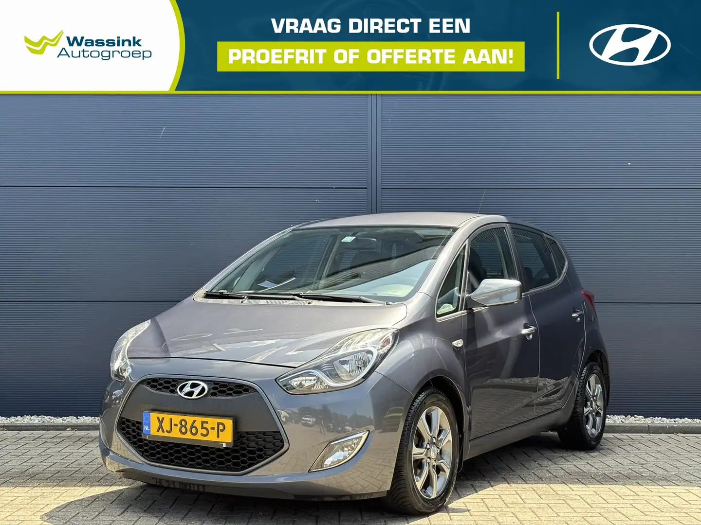Hyundai iX20 1.6i GDI 125pk Premium | Navigatie | Stuurverwarmi Grijs - 1