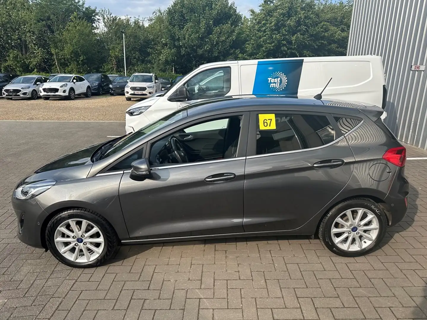 Ford Fiesta 1.0i 100pk Titanium+GPS+camera+parkh v en a+winter Grijs - 2
