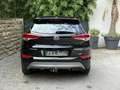 Hyundai TUCSON 4X4 2.0 CRDi 136 4WD Executive Schwarz - thumbnail 22