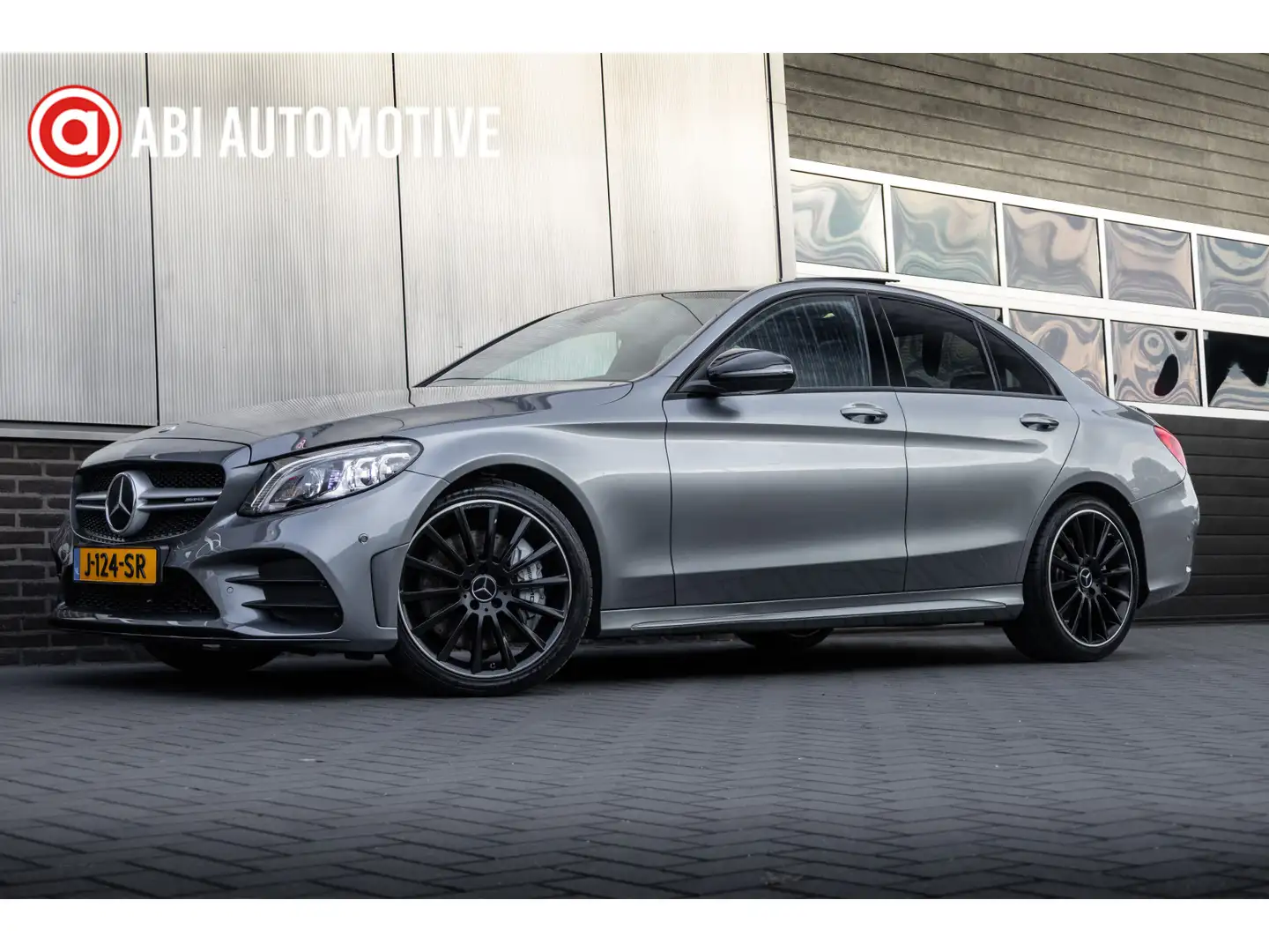 Mercedes-Benz C 43 AMG 4MATIC 391 pk Premium Plus Pack AMG-Pakket / Facel Grijs - 1