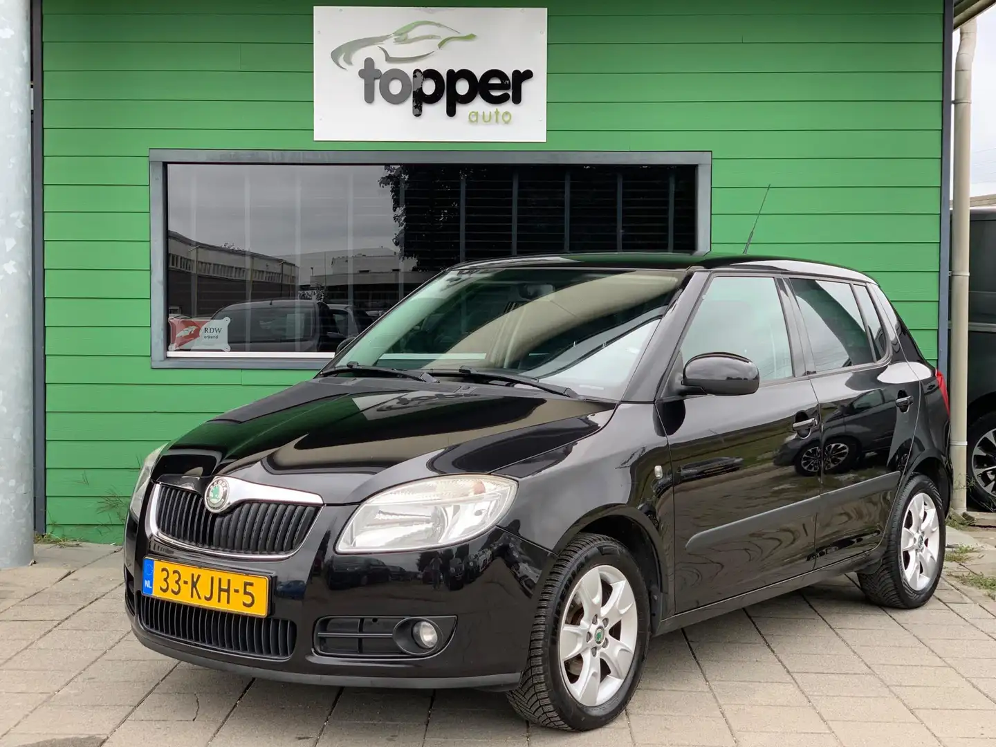 Skoda Fabia 1.4-16V Tour | Navigatie | CruiseControl | Airco | Noir - 1