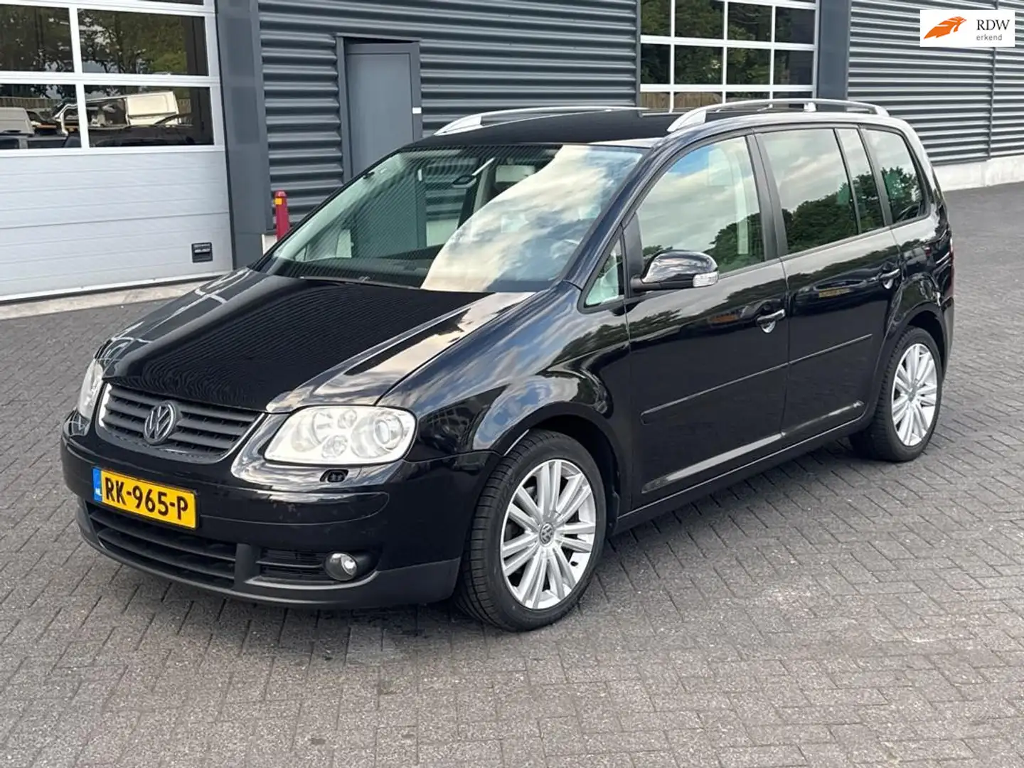 Volkswagen Touran 1.4 TSI Trendline stoelverwarming, airco Zwart - 1