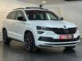 Skoda Karoq 2.0TSI SPORTLINE 4x4* LED#AHK#PANO#SH#KEYL Weiß - thumbnail 2
