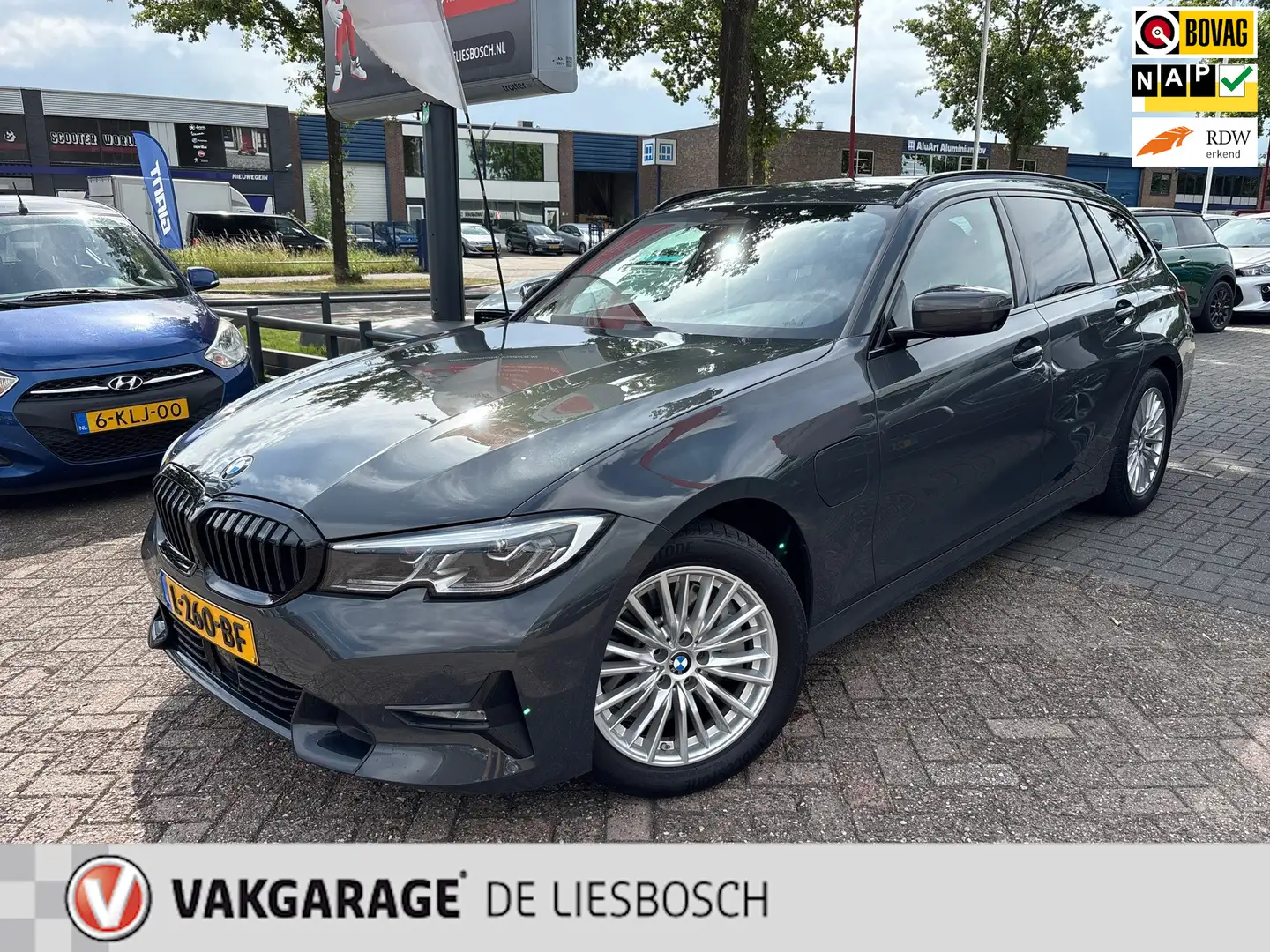 BMW 330 3-serie Touring 330e High Executive / individual / Grijs - 1