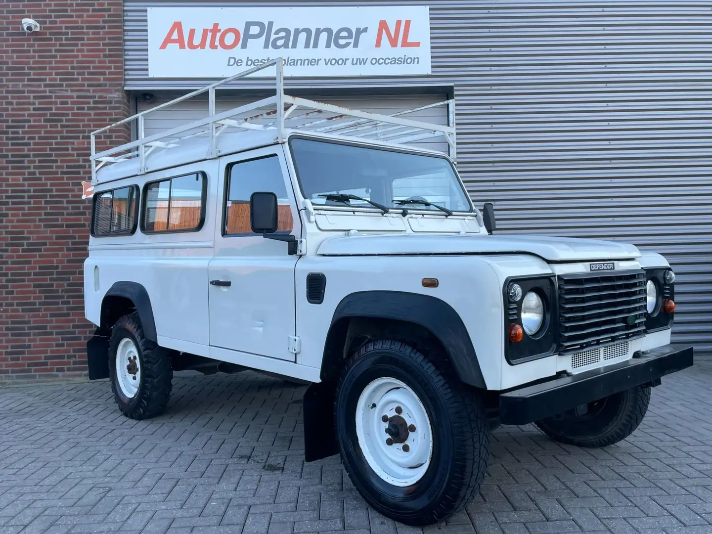 Land Rover Defender 2.5 Td5 110" County! 9-Persoons! Weiß - 1