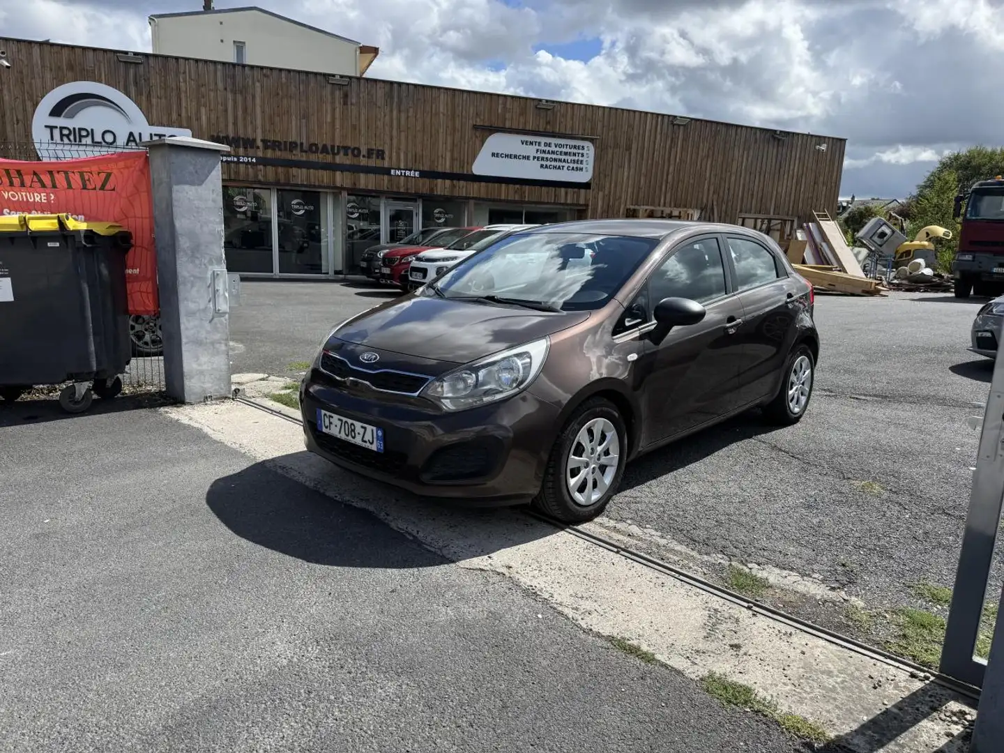 Kia Rio 1.2i - 85 Active Clim Brun - 1