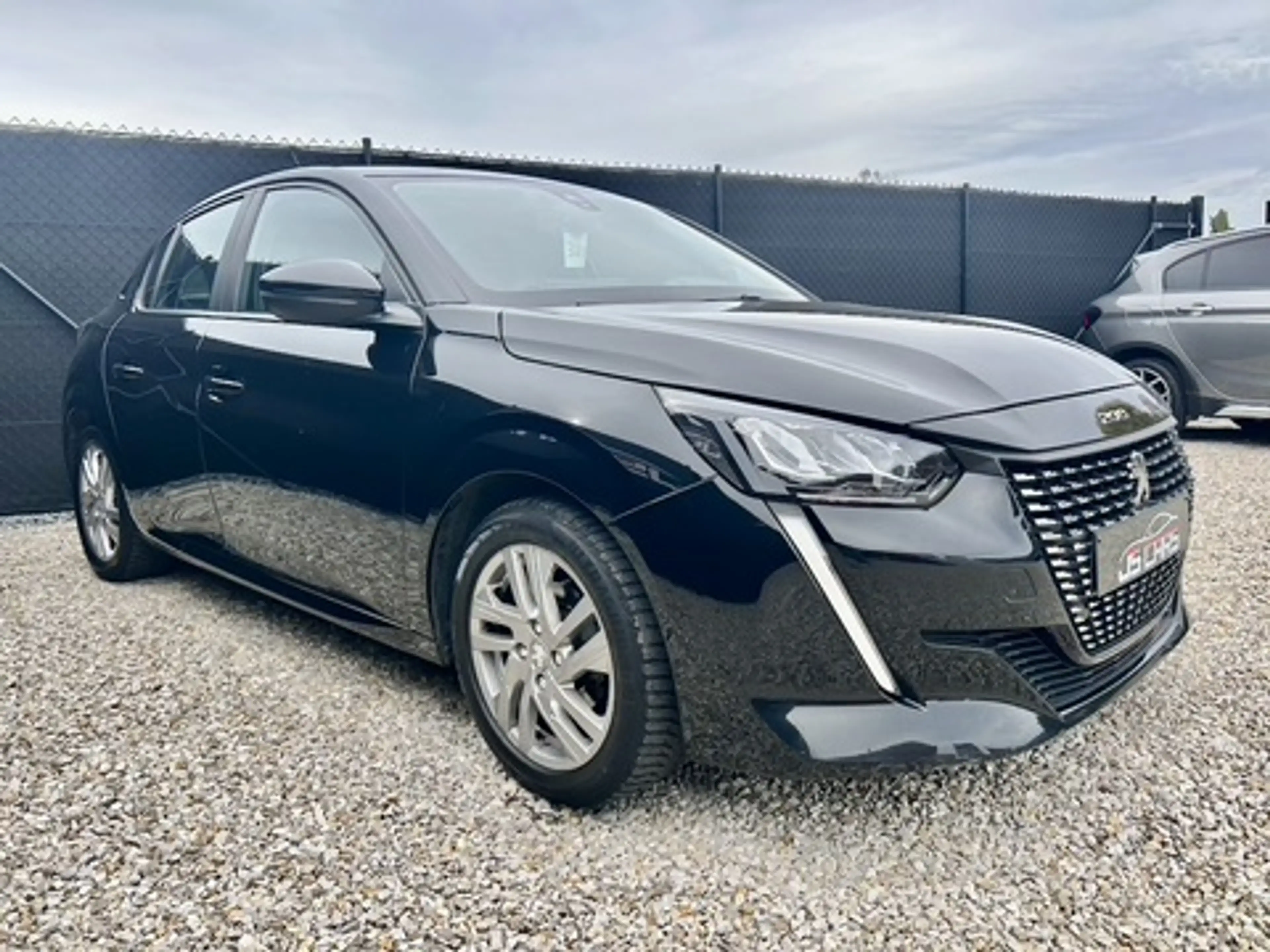 Peugeot 208 1.2i*1er PROP*GPS*CAR-PLAY*PDC*LED*AIRCO AUTO* — photo 5