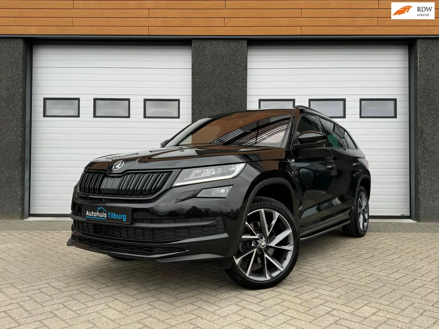 Skoda Kodiaq 2.0 TSI 4x4 Sportline 190PK Pano Virtual 360' Schwarz - 1
