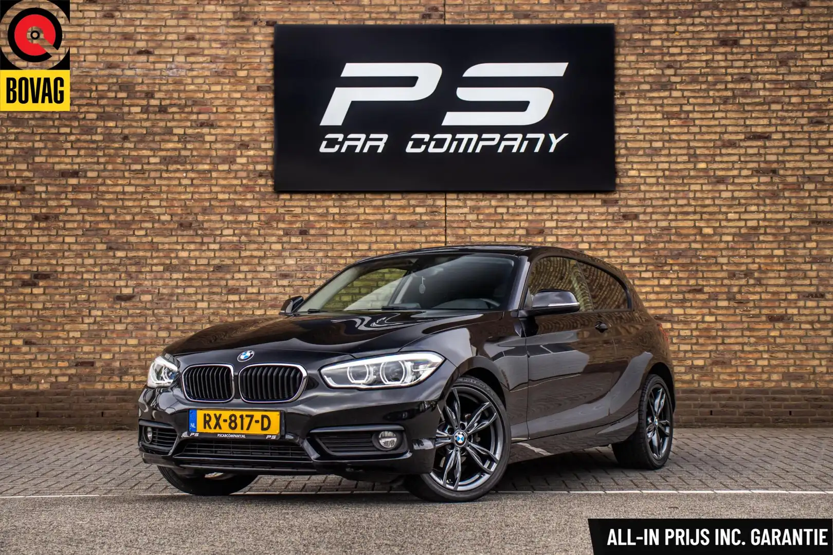 BMW 118 1-serie 118i Executive, NAP, LED, 18 Inch M-Sport, Zwart - 1