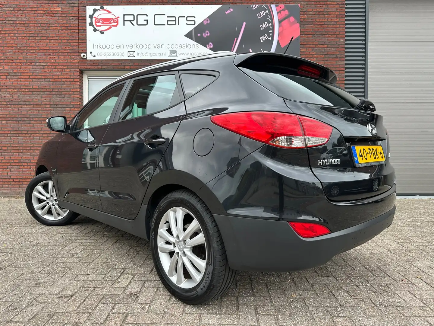 Hyundai iX35 2.0i i-Catcher / Schuifdak / Leder / Navi / Camera Zwart - 2
