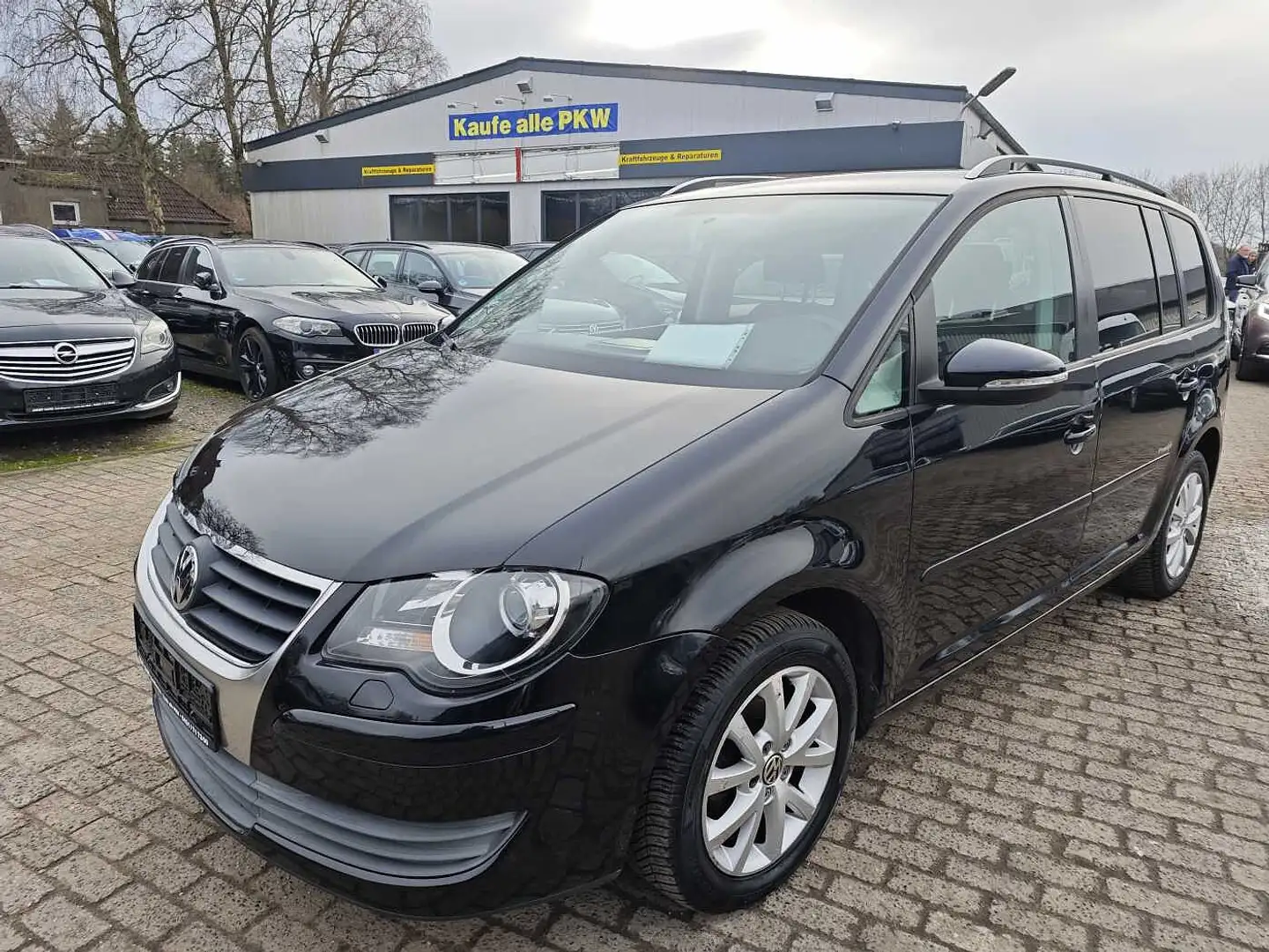 Volkswagen Touran 1.4 TSI DSG Highline Schwarz - 1