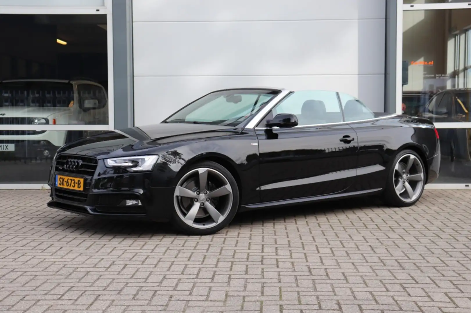 Audi A5 Cabriolet 2.0 TFSI (225PK) Quattro Aut S-Line Spor Zwart - 1